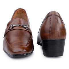 Brown leather loafers worn with black