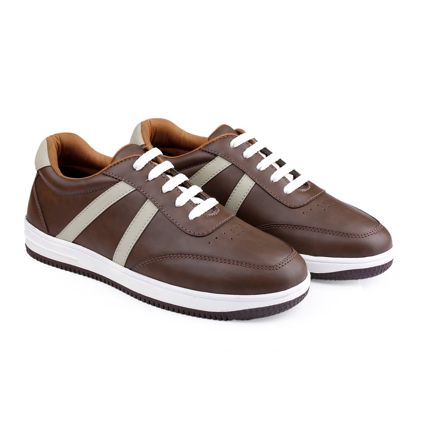 Pair of brown sneakers with white laces on a white background