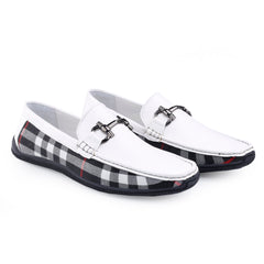 White loafers with plaid pattern on soles on a white background
