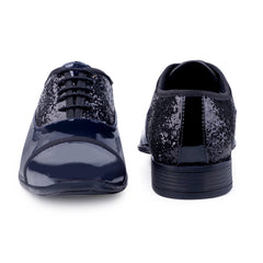 Black glittery shoes on a white background