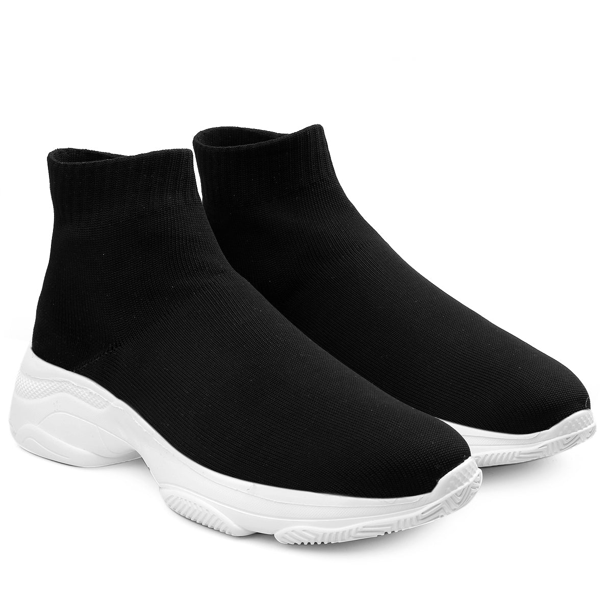 Black sock boots with white soles on a white background