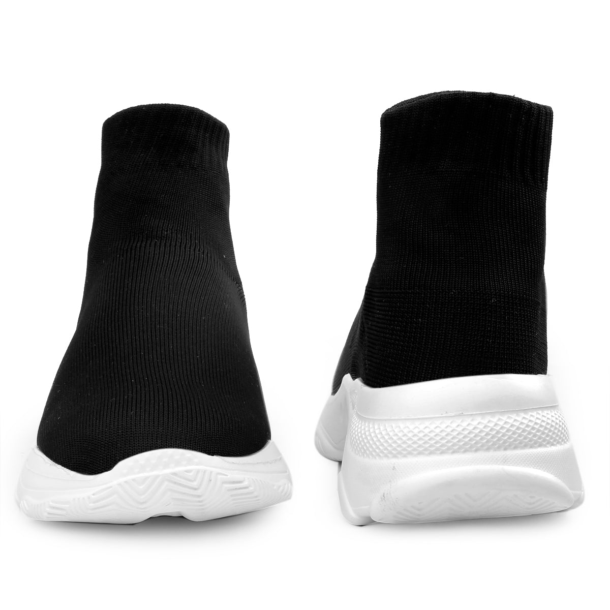 Black sock-style shoes with white soles on a white background