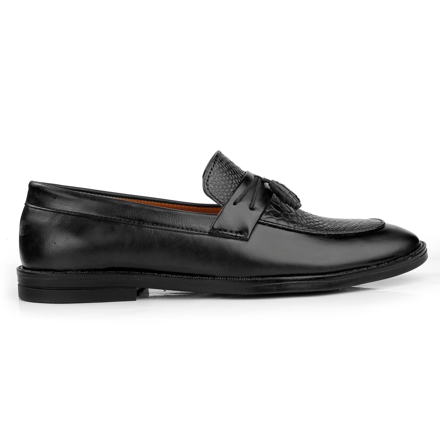 Black leather loafer with tassel on a white background