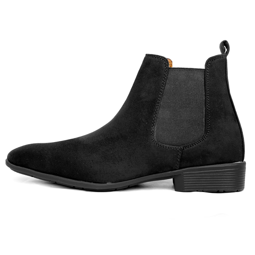 Black Chelsea boot on a white background