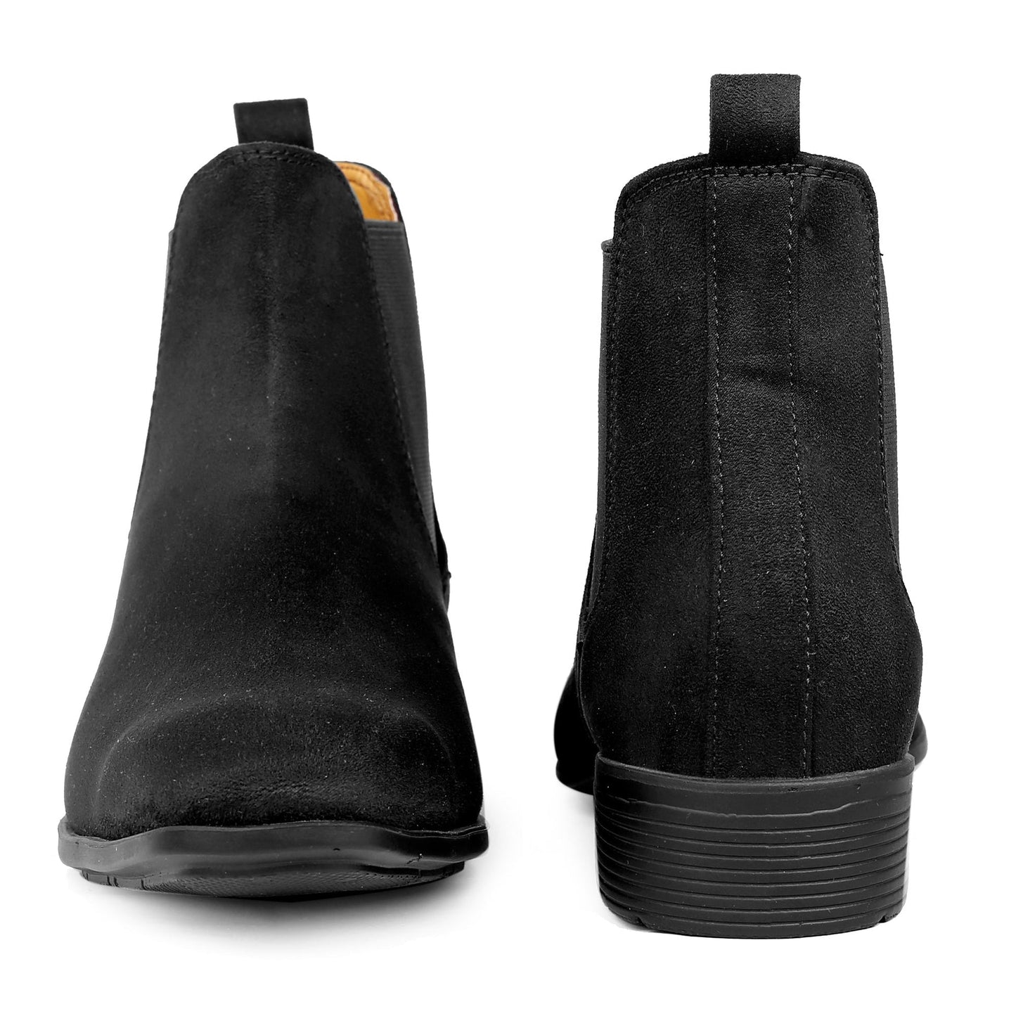 Black suede boots with a white background