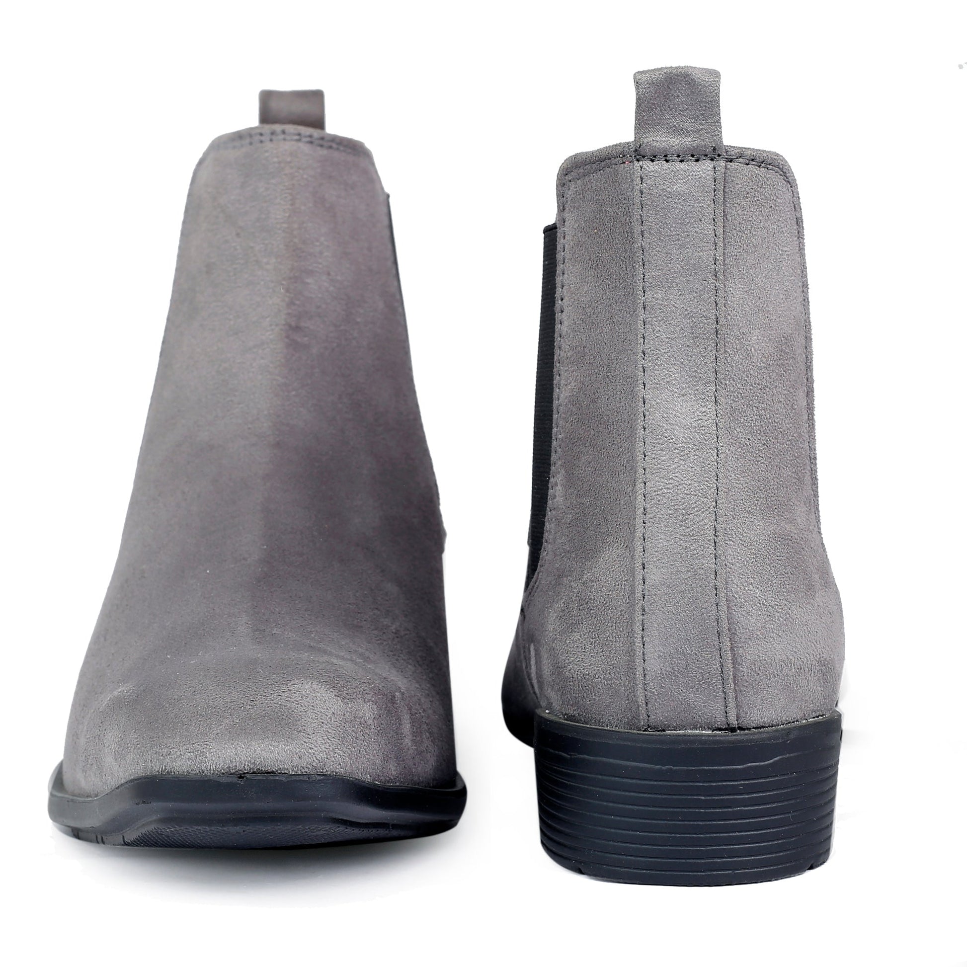 Pair of gray suede ankle boots on a white background