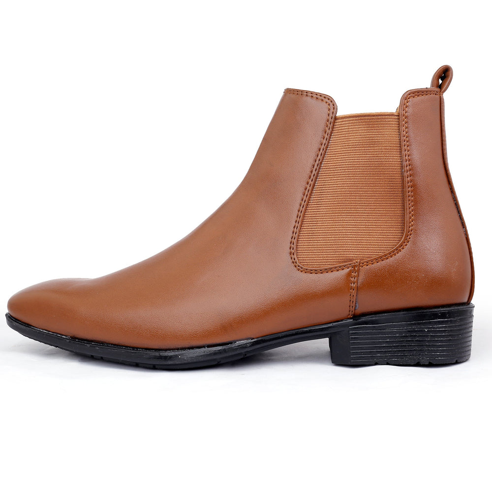 Brown leather Chelsea boot on a white background
