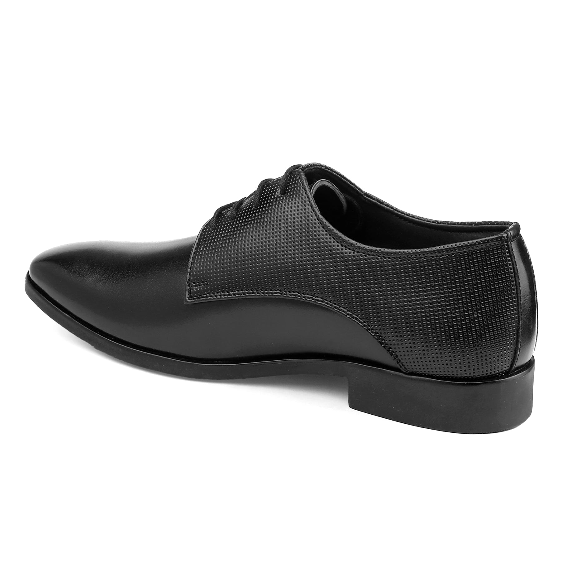 Black dress shoe on a white background
