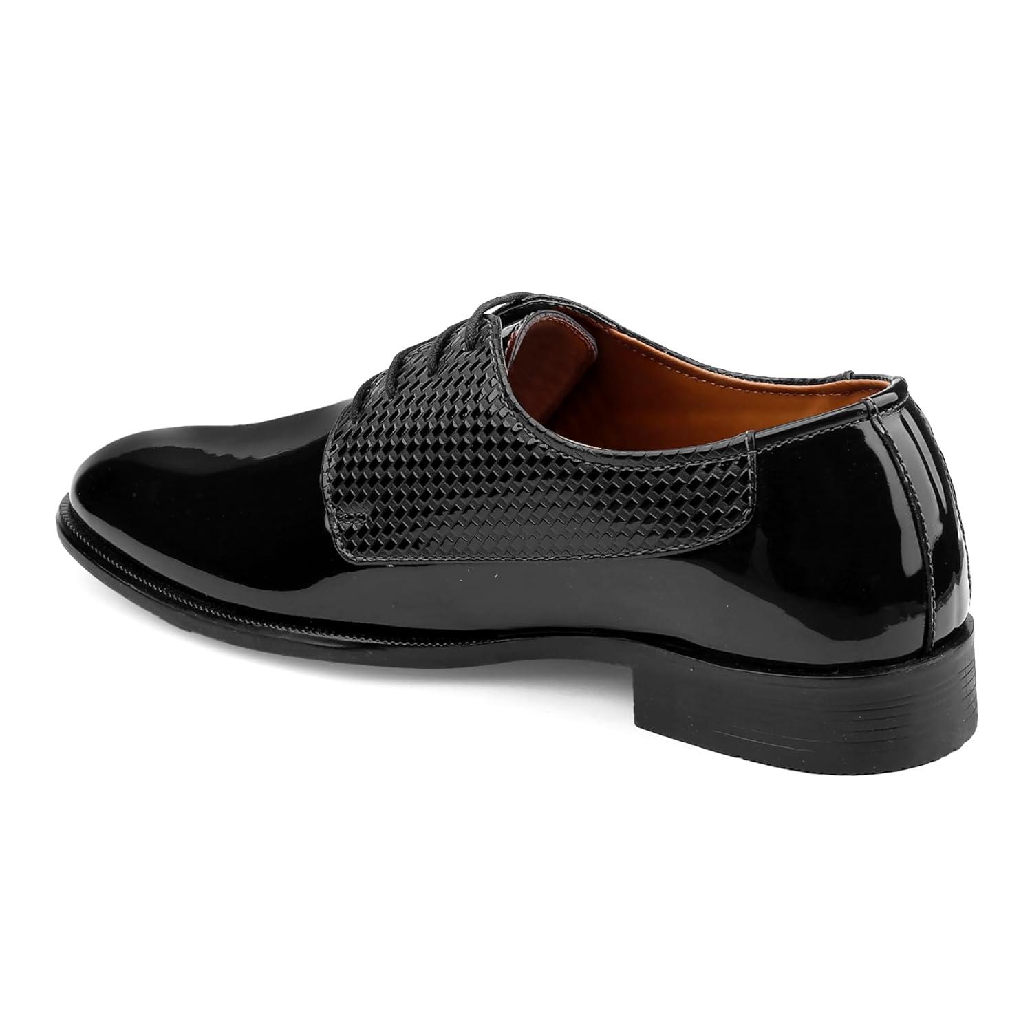 Black patent leather shoe with a textured strap on a white background
