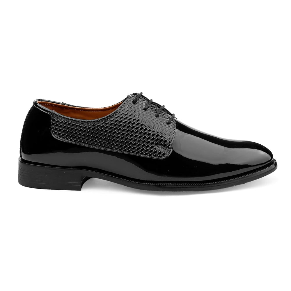 Black patent leather shoe with gray textured patch on a white background