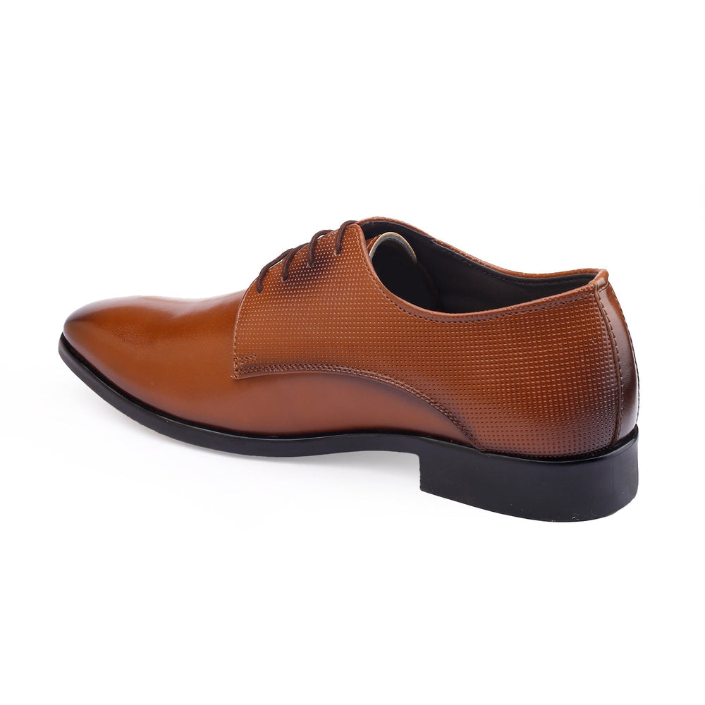 Brown leather dress shoe on a white background