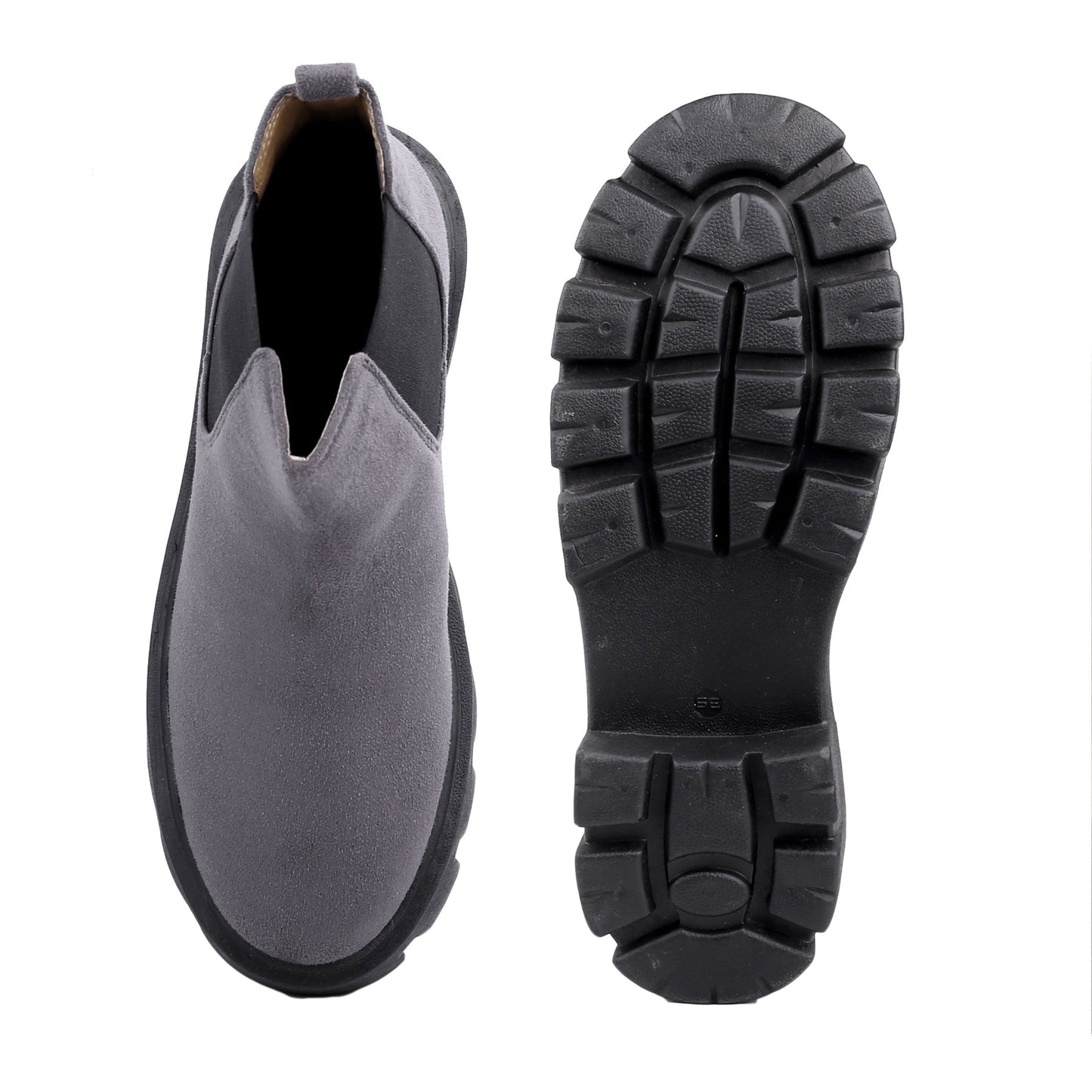 Gray slip-on shoe with black sole on a white background