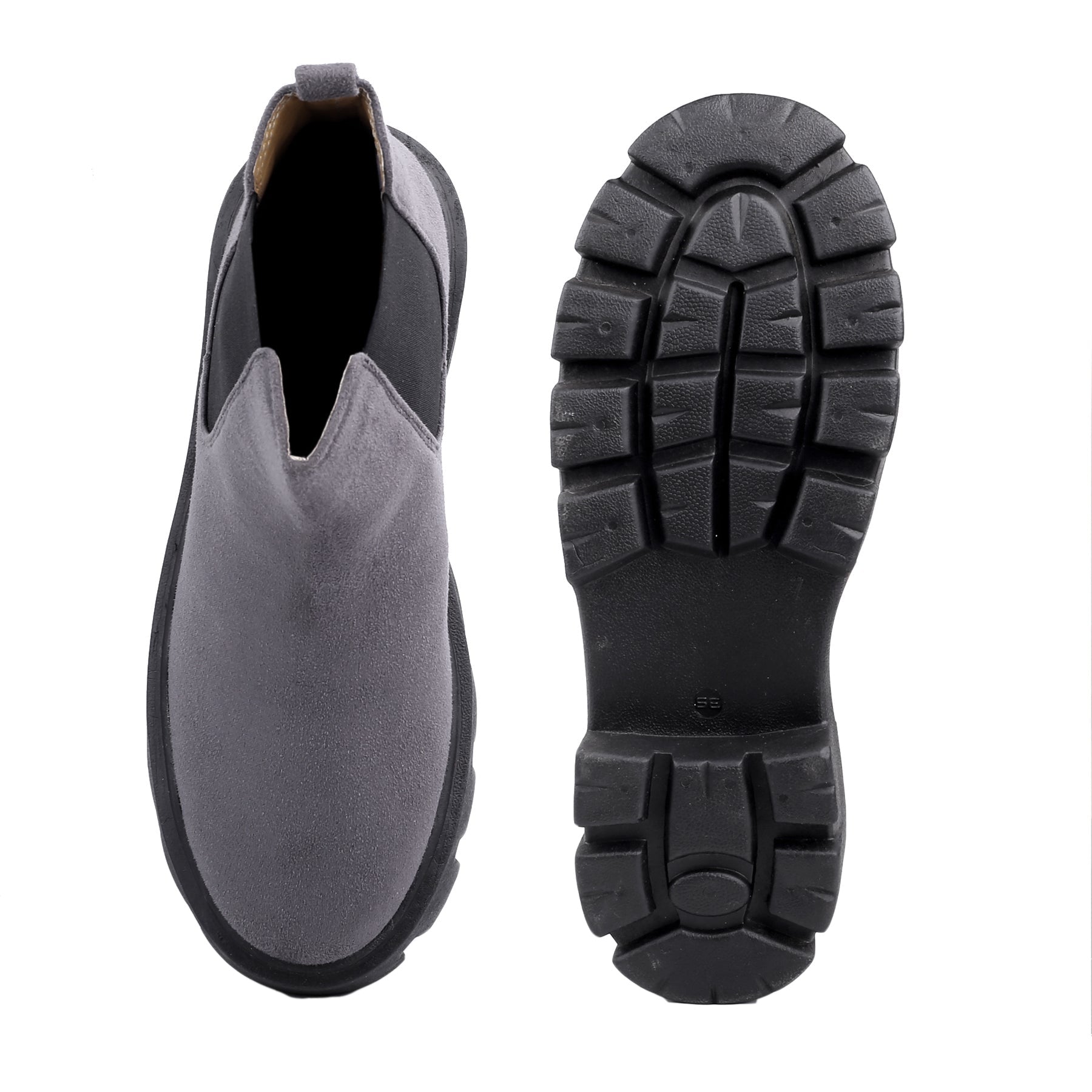 Gray slip-on shoe with black sole on a white background