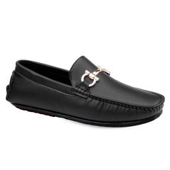 Black loafer shoe with a gold buckle on a white background