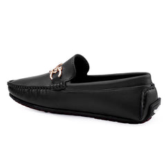 Black loafer with a rose gold buckle on a white background