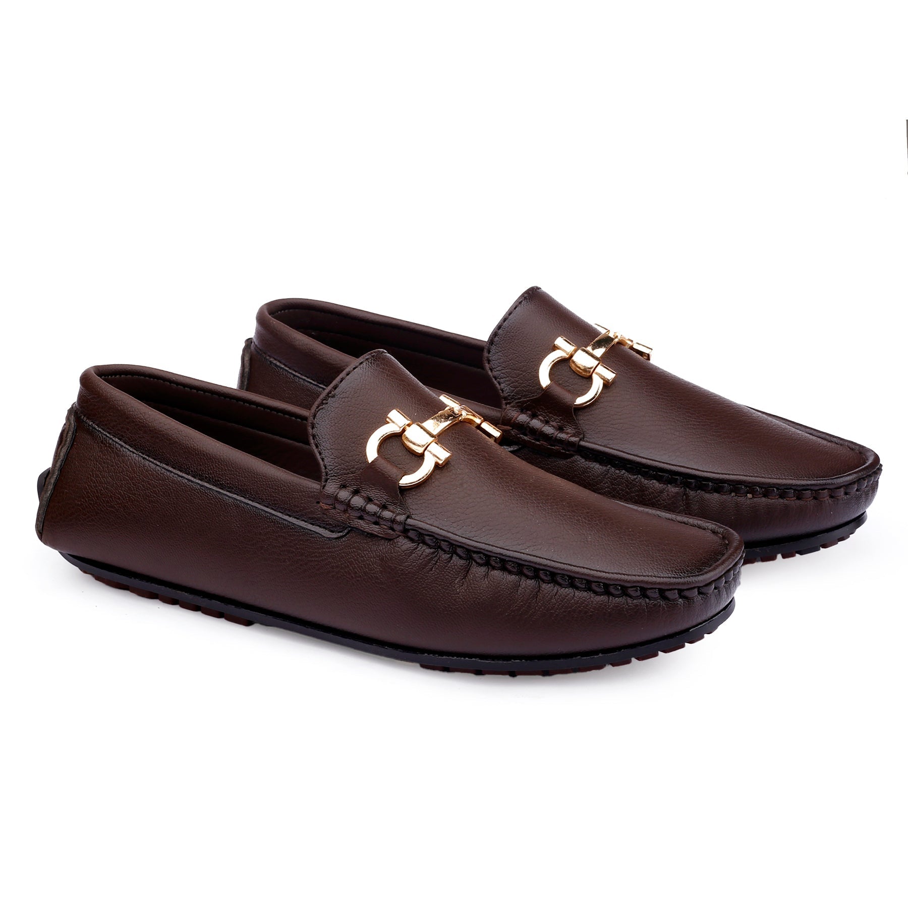 Pair of brown loafers with gold accents on a white background