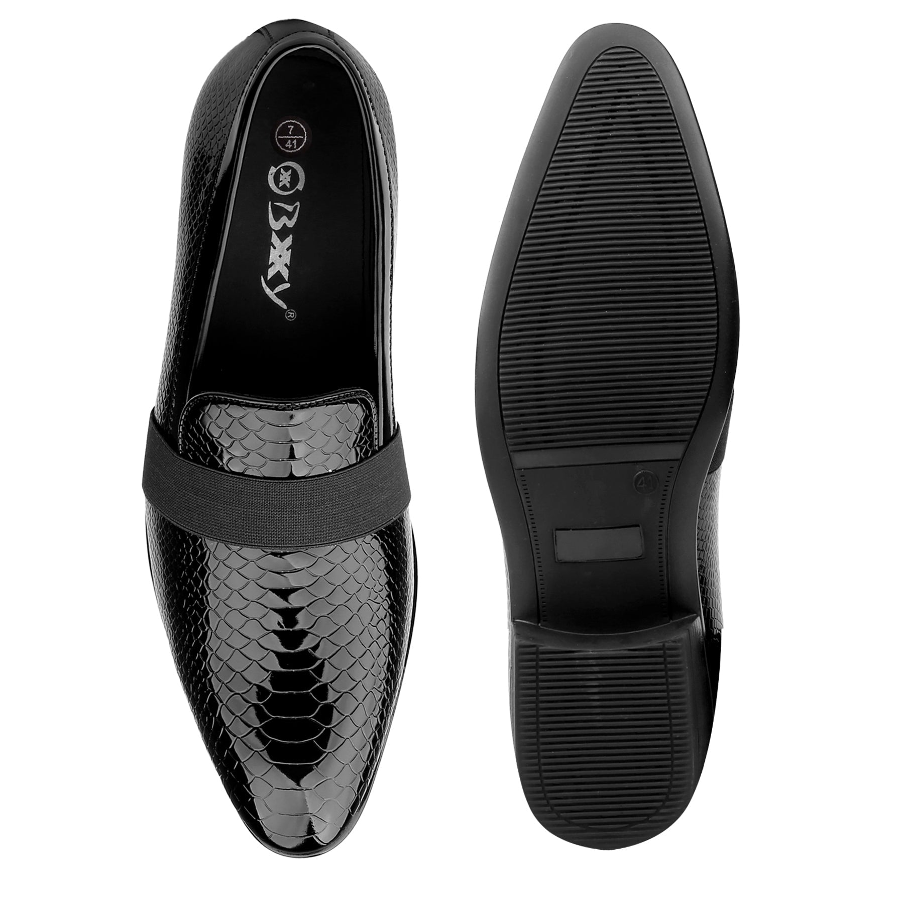 Black dress shoes with snake pattern on a white background