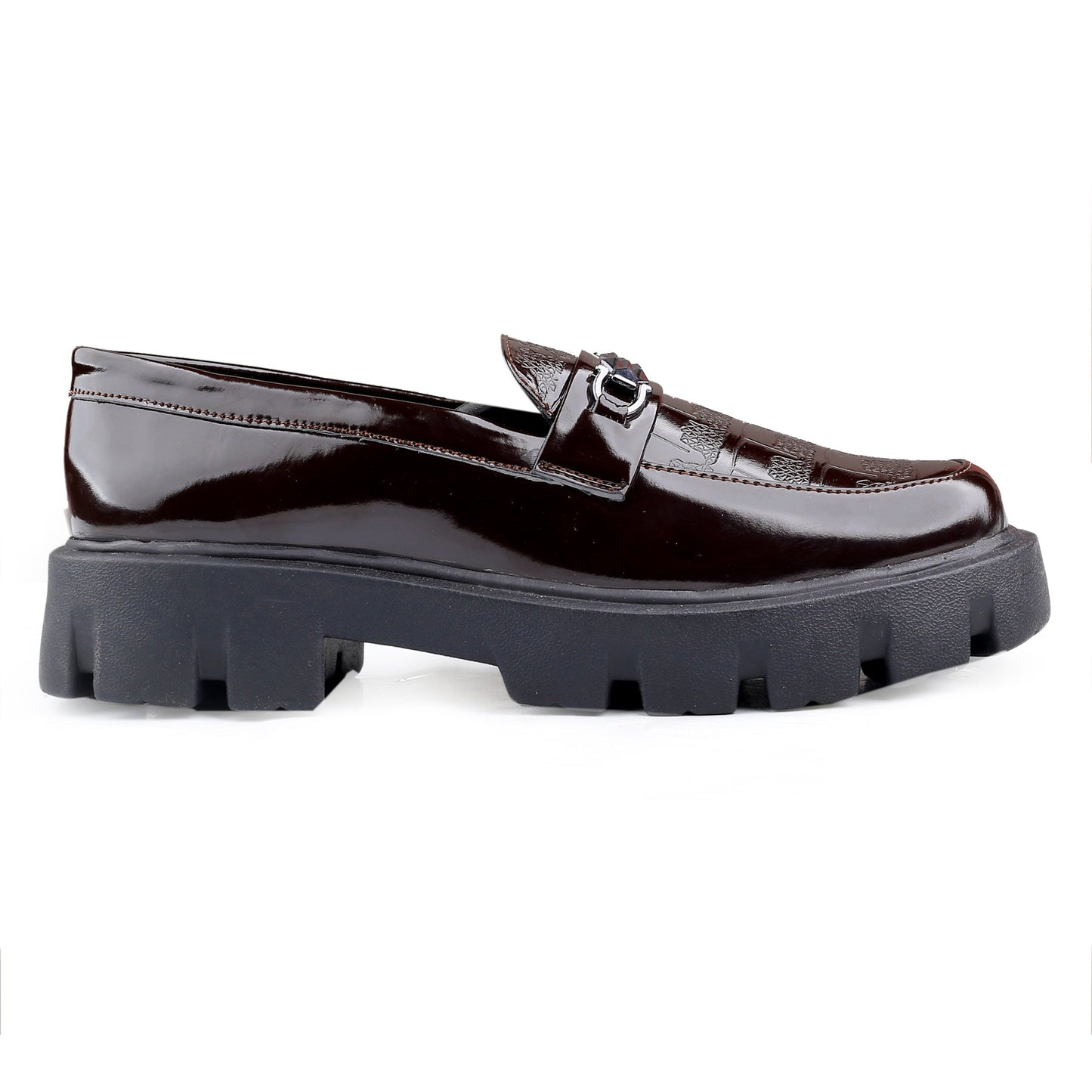 Black patent leather loafer with chunky sole on a white background
