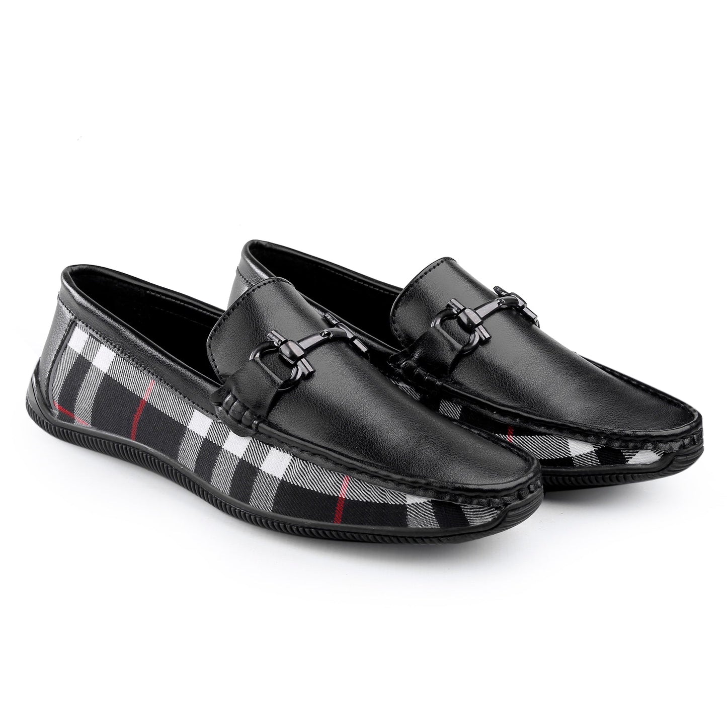 Black loafers with plaid pattern on a white background