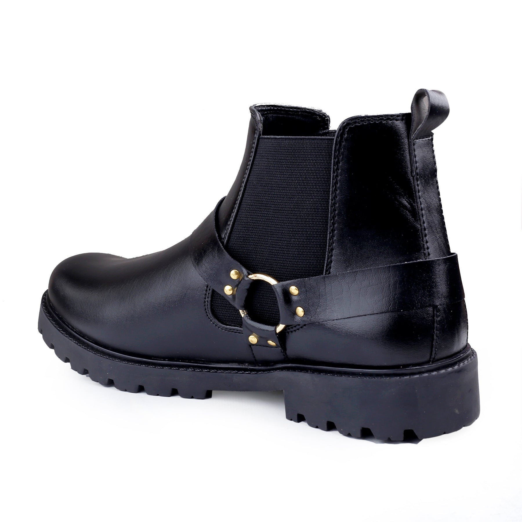 Black leather boot with gold buckle on a white background