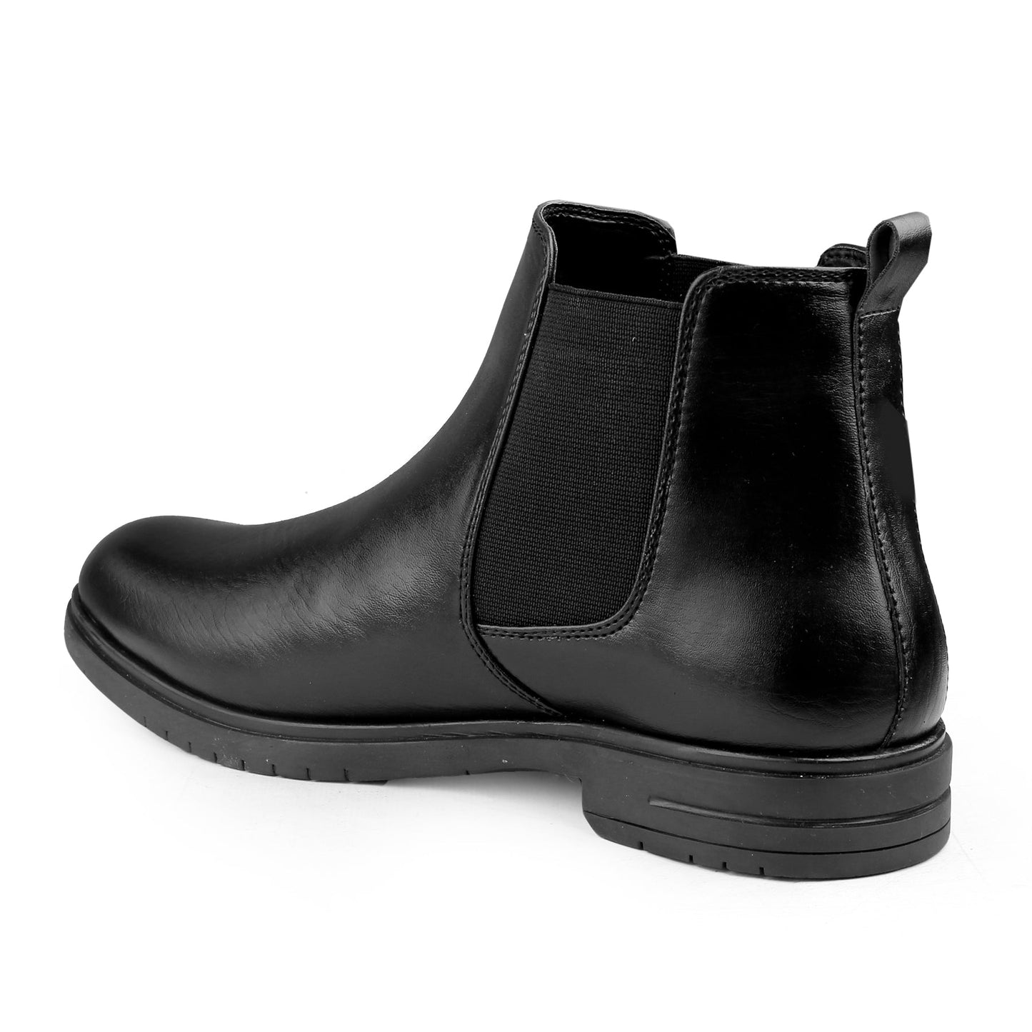 Black Chelsea boot on a white background