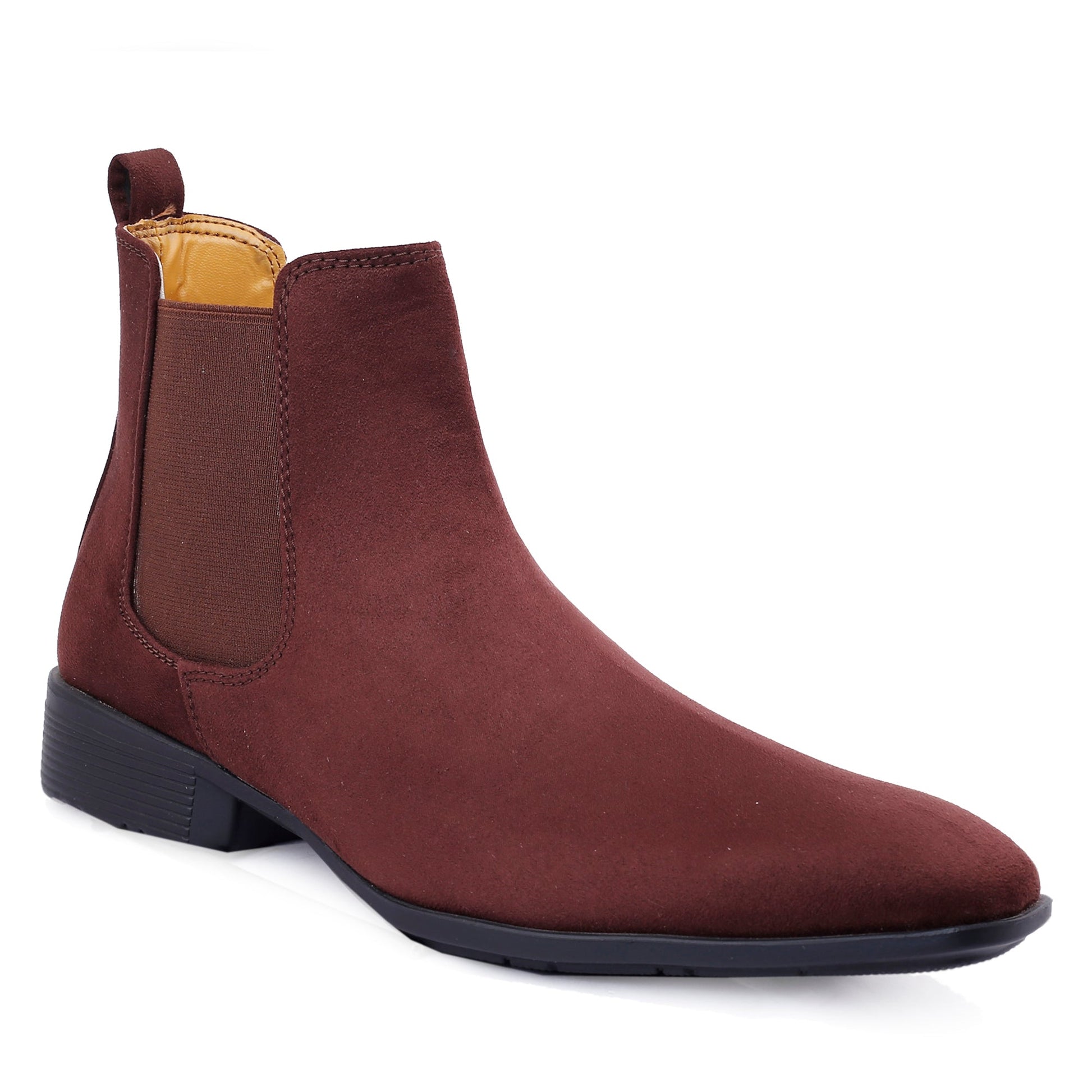Brown leather Chelsea boot on a white background