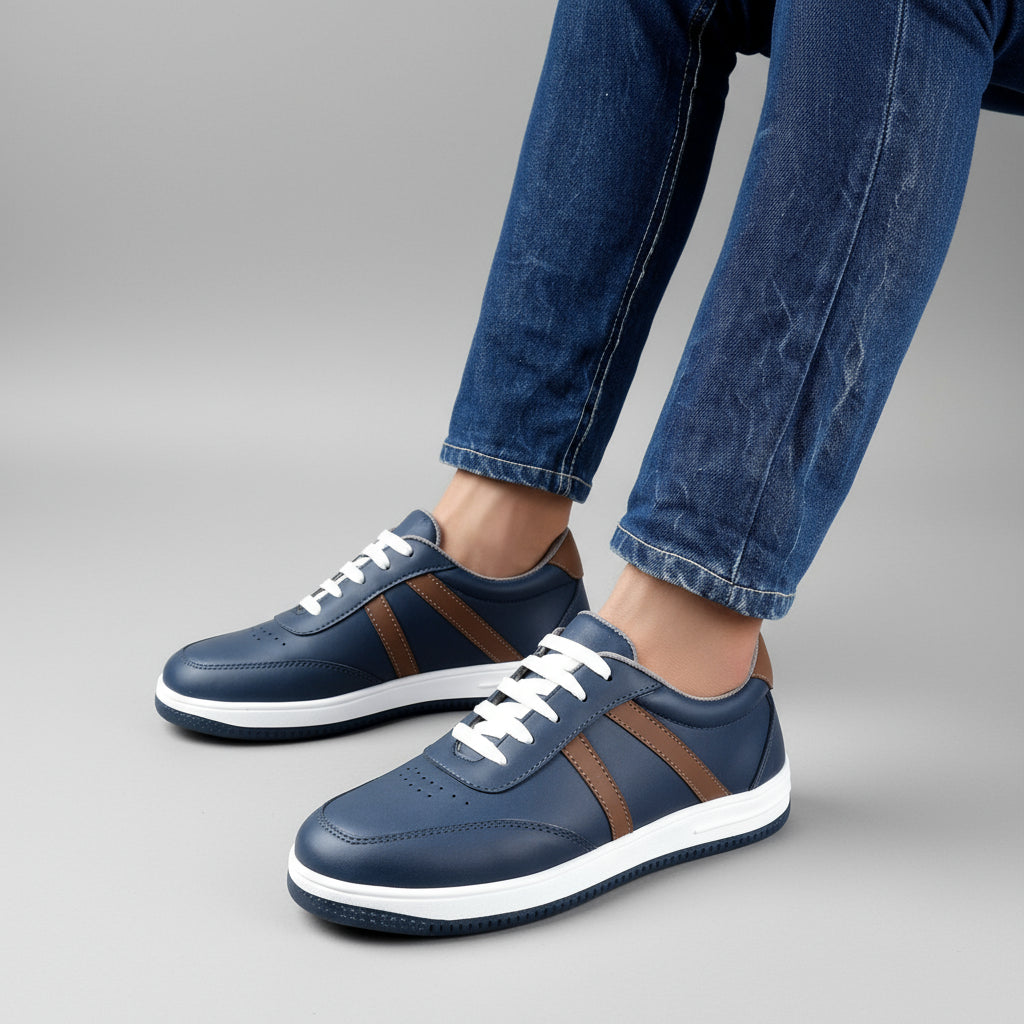 Blue sneakers with white laces worn by a person on a wooden surface