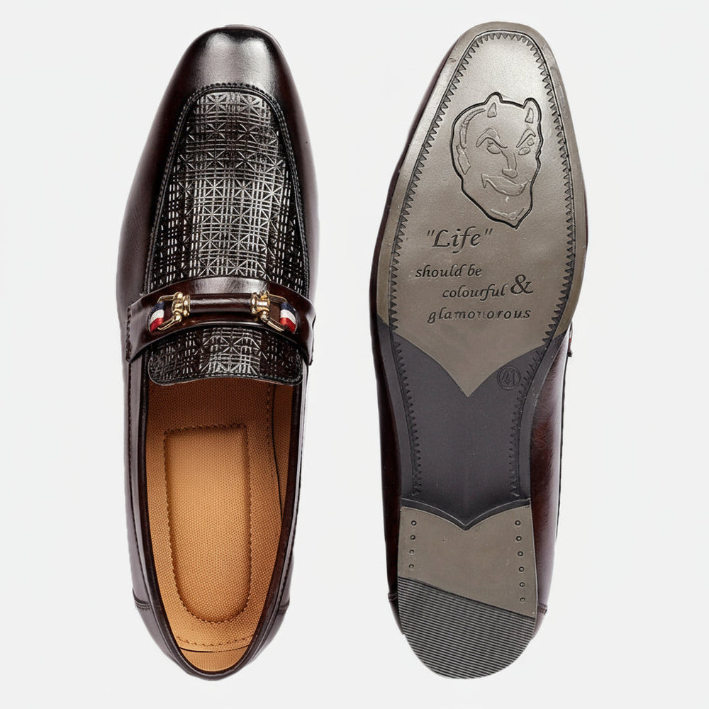 Brown loafers with decorative pattern on the toe cap and 'Life should be colourful & glamorous' text on the sole.