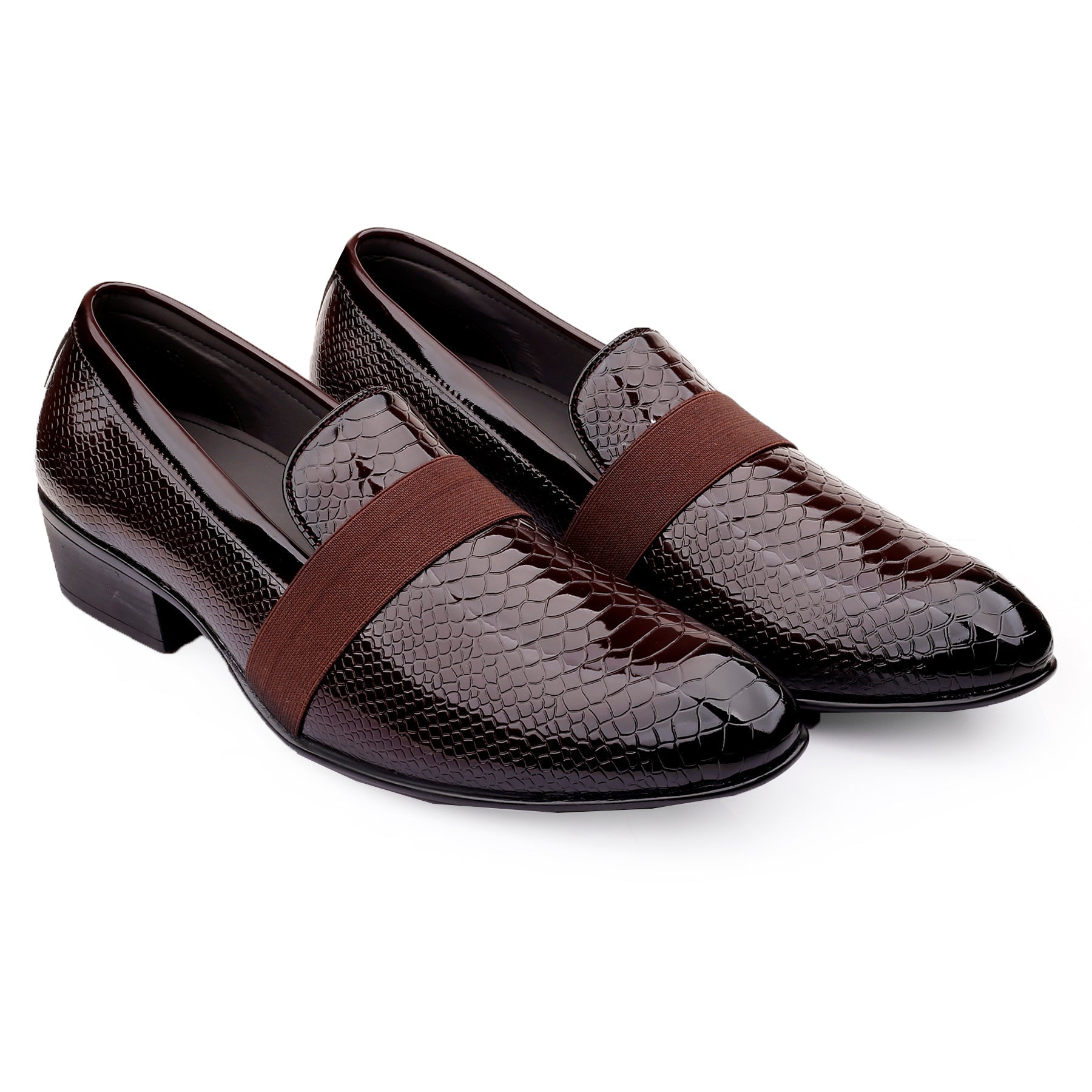 Pair of brown leather loafers with snake skin pattern on a white background