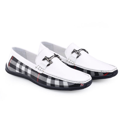 White loafers with plaid pattern on soles on a white background