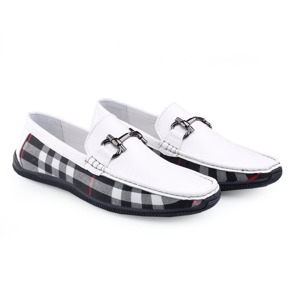 White loafers with plaid pattern on soles on a white background