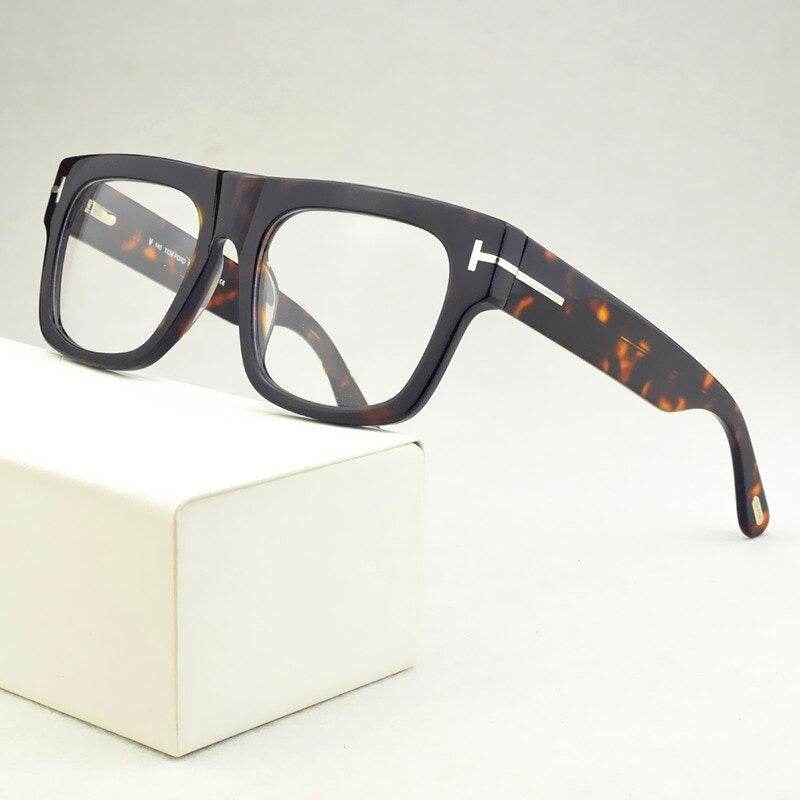 Stylish black square frame eyeglasses online with a tortoiseshell accent on the sides.