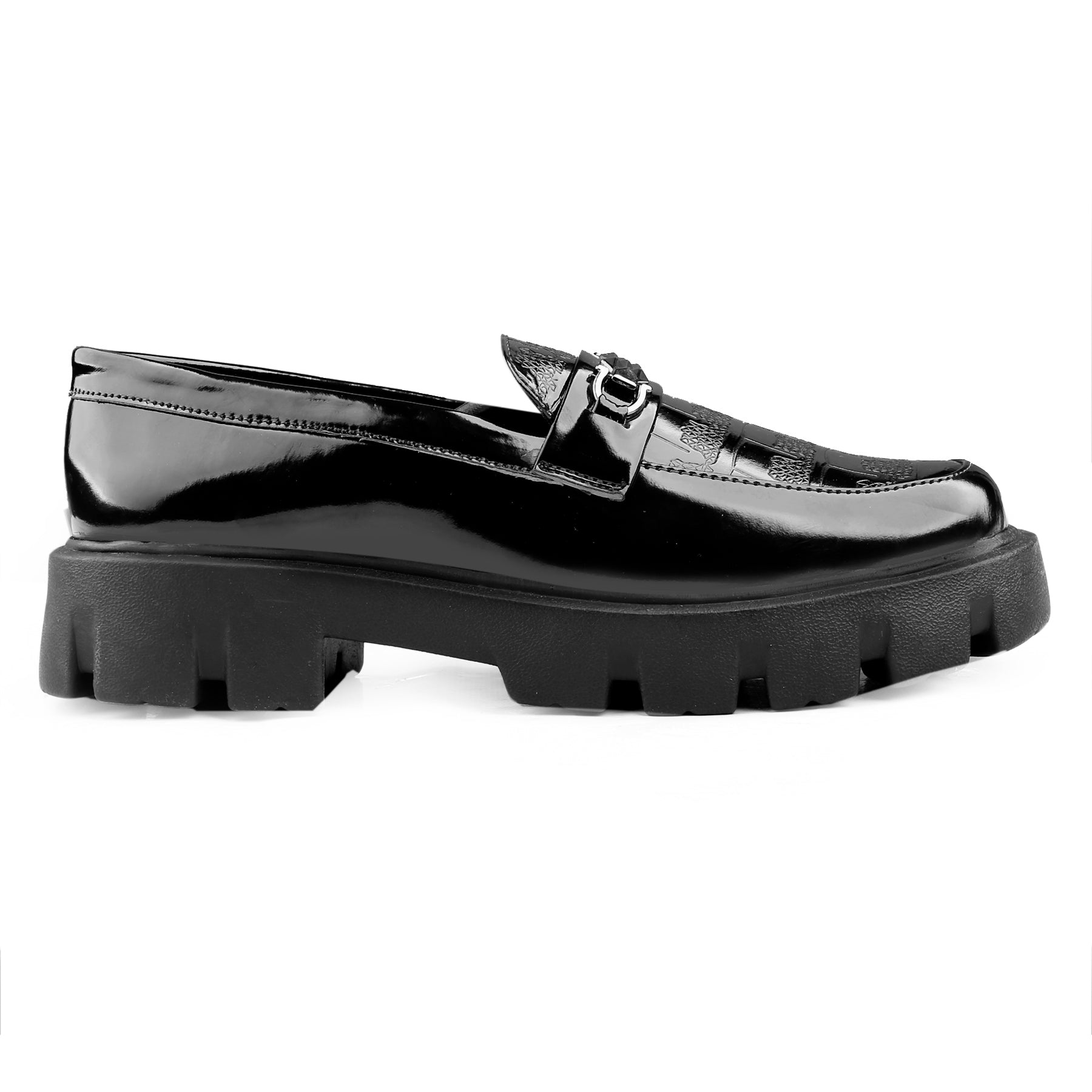 Black patent leather loafer with chunky sole on a white background