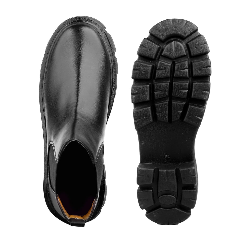 Black rubber boot with sole view on a white background