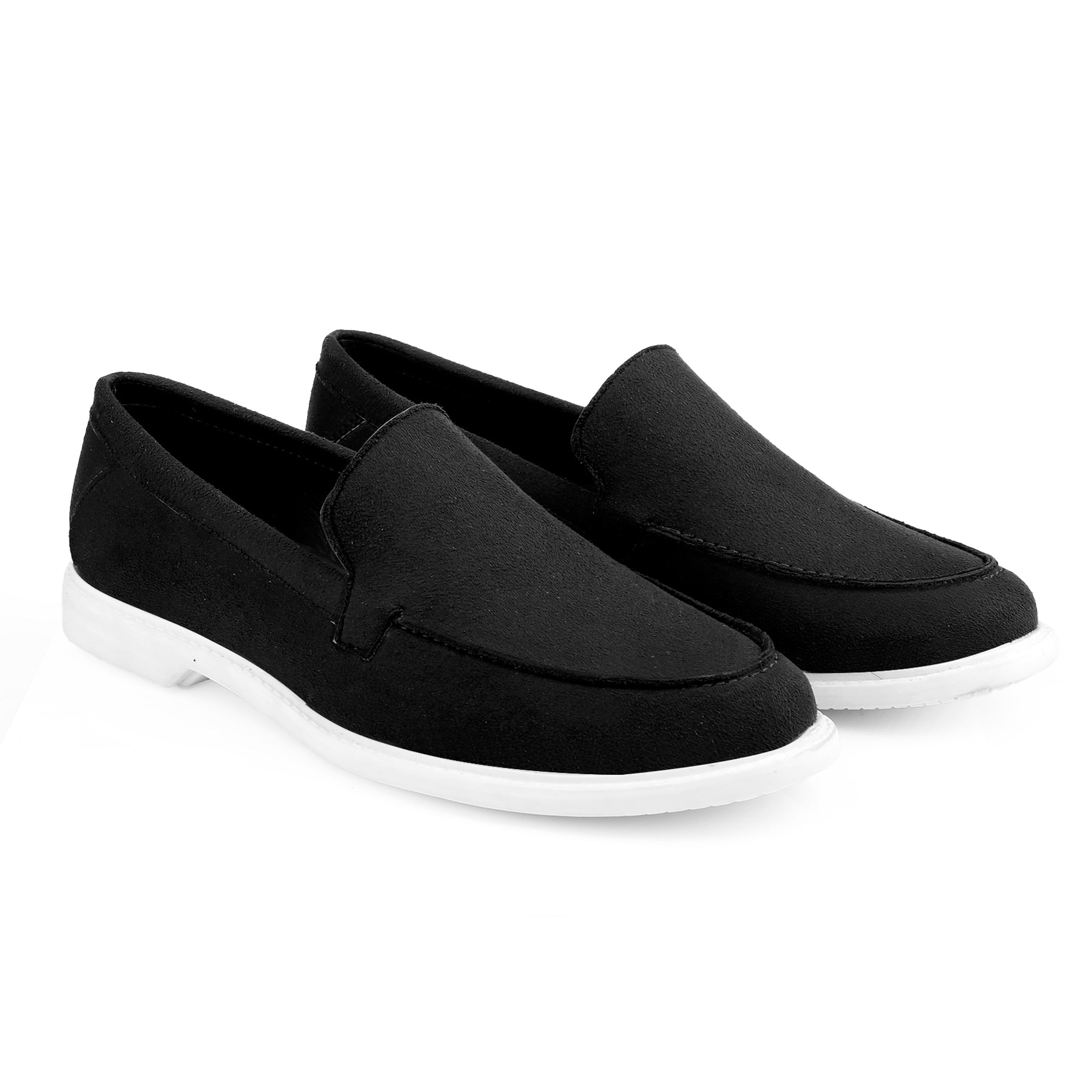Pair of black loafers on a white background