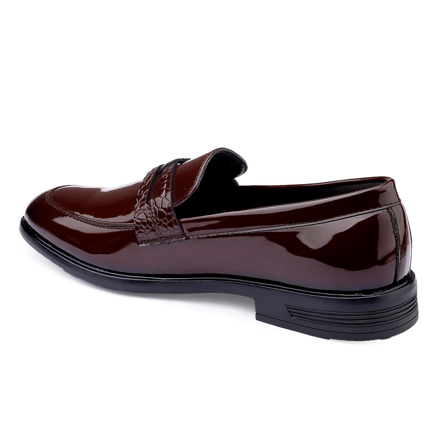 Shiny brown loafer shoe on a white background