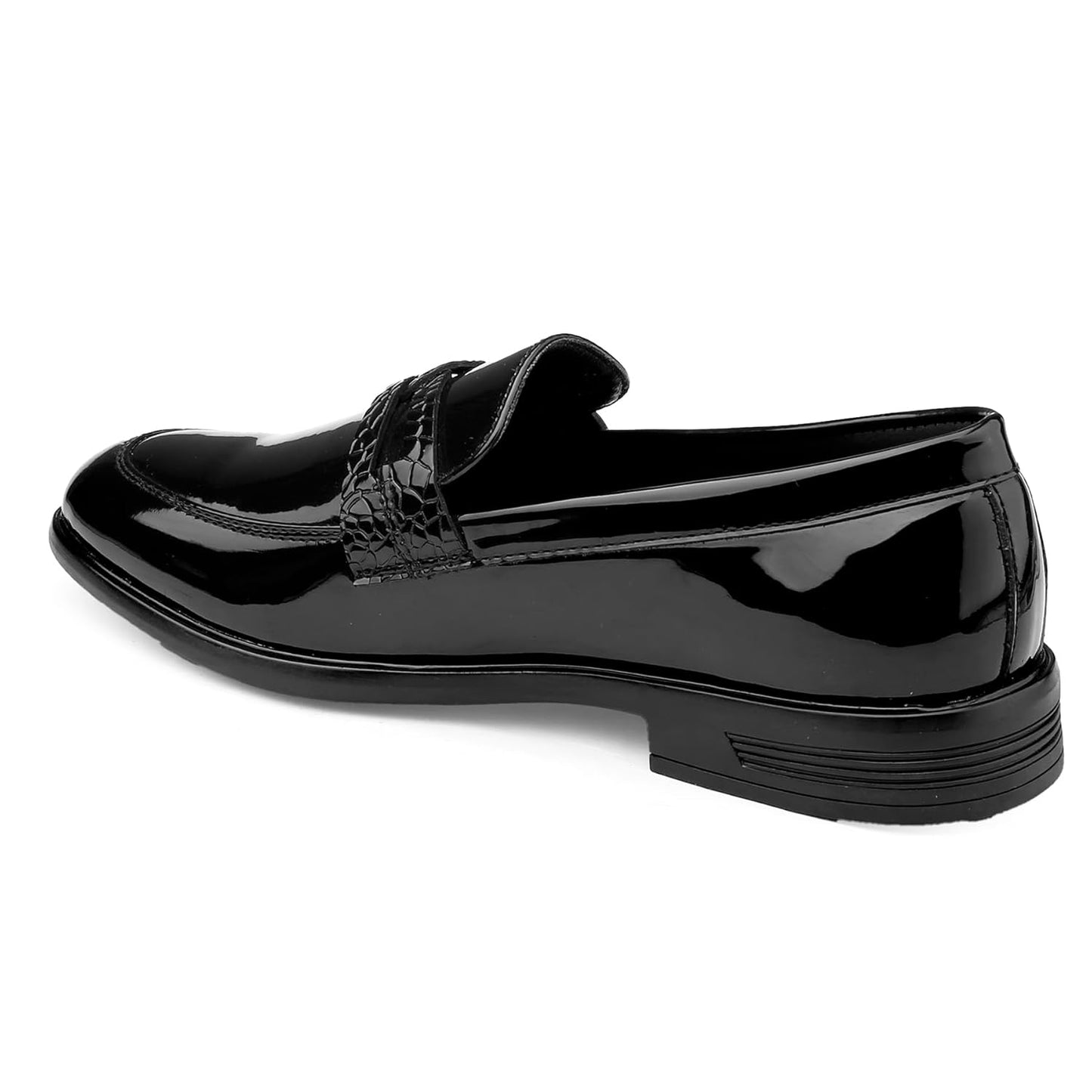 Black patent leather loafer on a white background